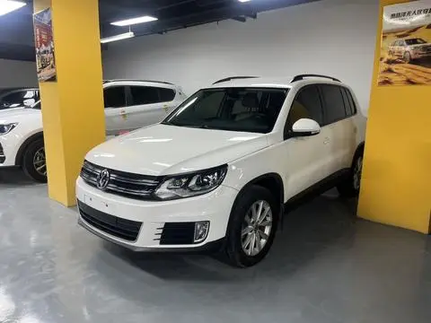 Volkswagen Tiguan 2014 — фото 1