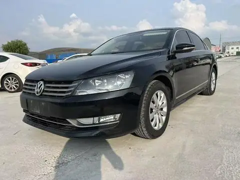 Volkswagen Passat 2014 — фото 1