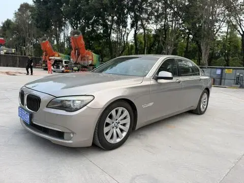 BMW 7 Series 2011 — фото 1
