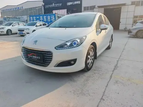 Peugeot 308 2014 — фото 1