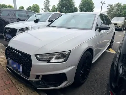 Audi A4L 2018 — фото 1