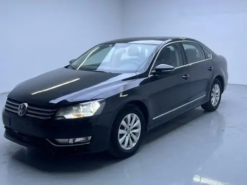 Volkswagen Passat 2014 — фото 1