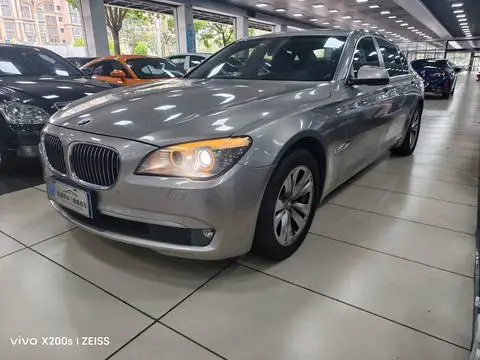 BMW 7 Series 2011 — фото 1