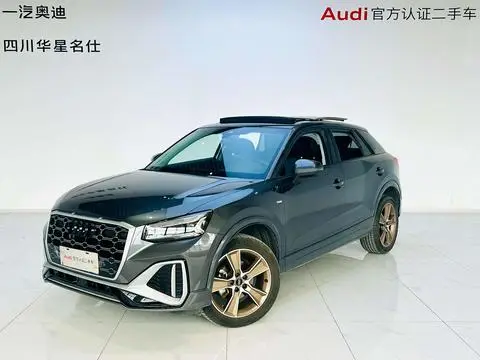 Audi Q2L 2022 — фото 1