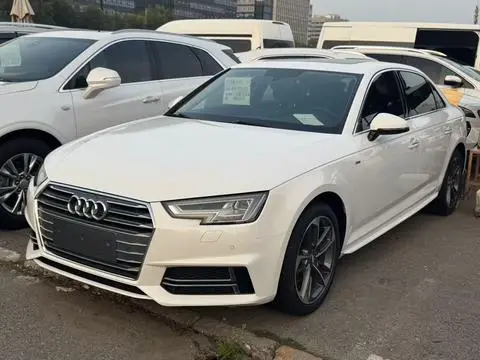 Audi A4L 2018 — фото 1