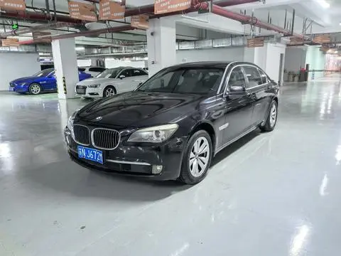 BMW 7 Series 2011 — фото 1