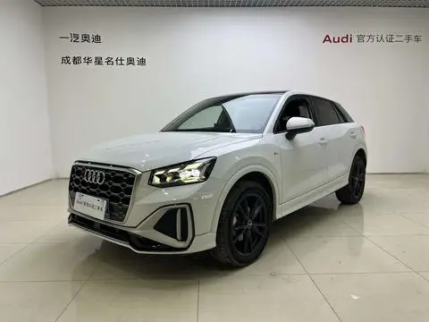 Audi Q2L 2022 — фото 1