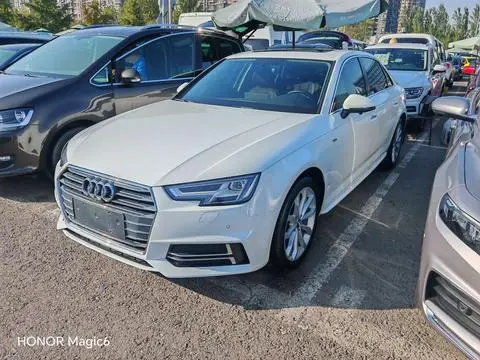 Audi A4L 2018 — фото 1