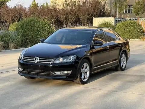 Volkswagen Passat 2013 — фото 1